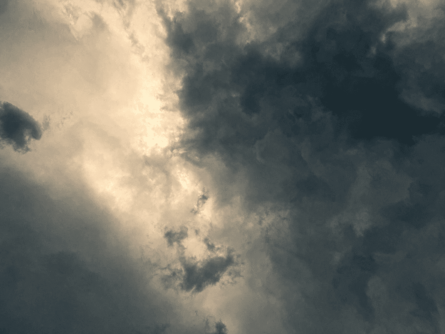 Arizona monsoon clouds opening over the landscape